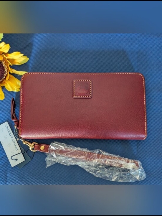 Dooney & Bourke Handbags - NWT! Dooney and Bourke Florentine Leather Wallet  in BORDEAUX